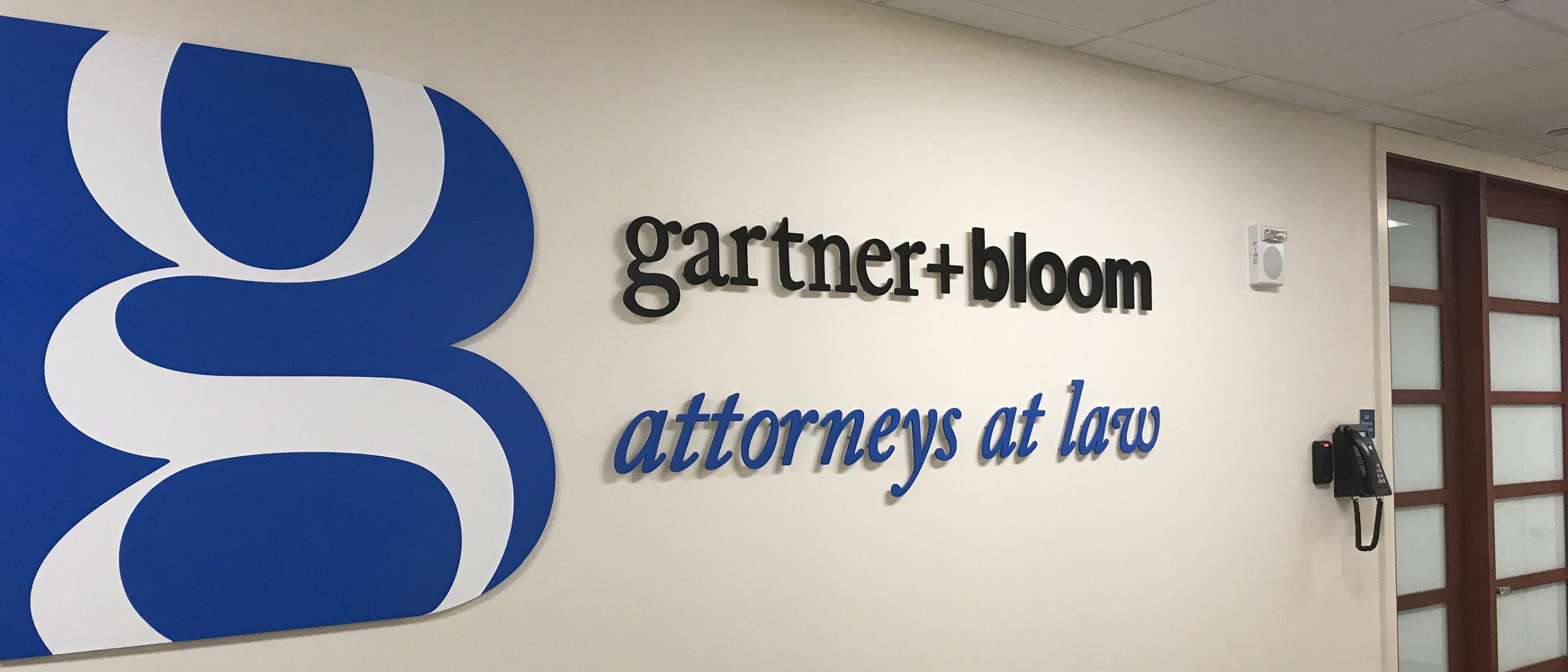 gartner & bloom office wall sign