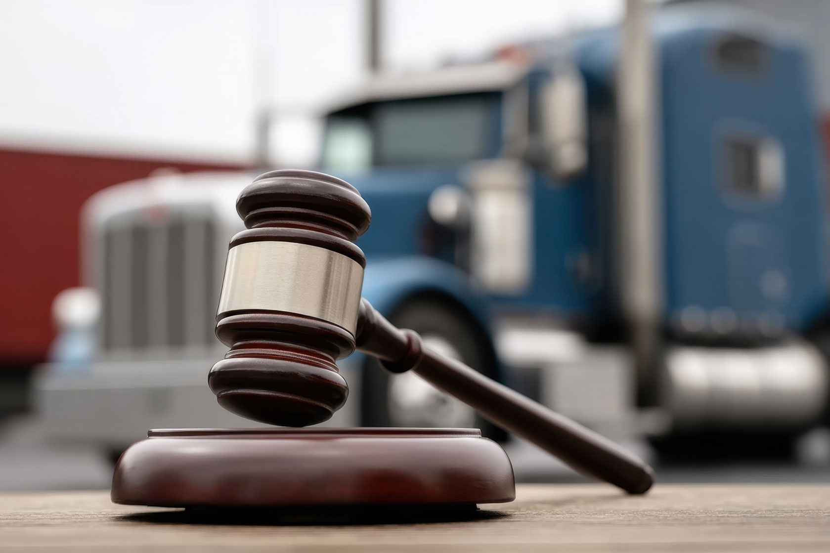 gavel with truck in background